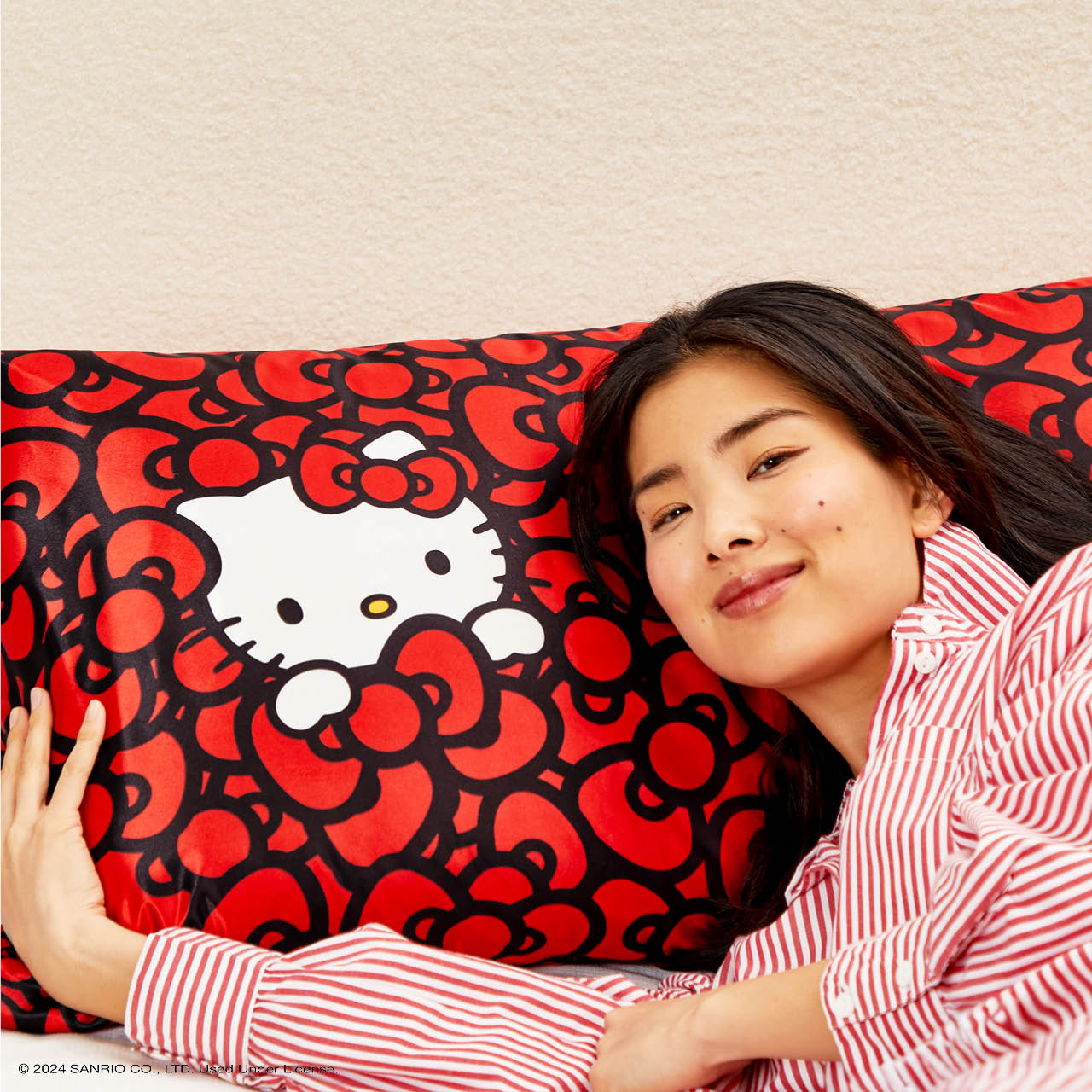 Kitsch x Hello Kitty Satin Pillowcase in Kitty Bathes in a Sea of Bows - Signature Selection
